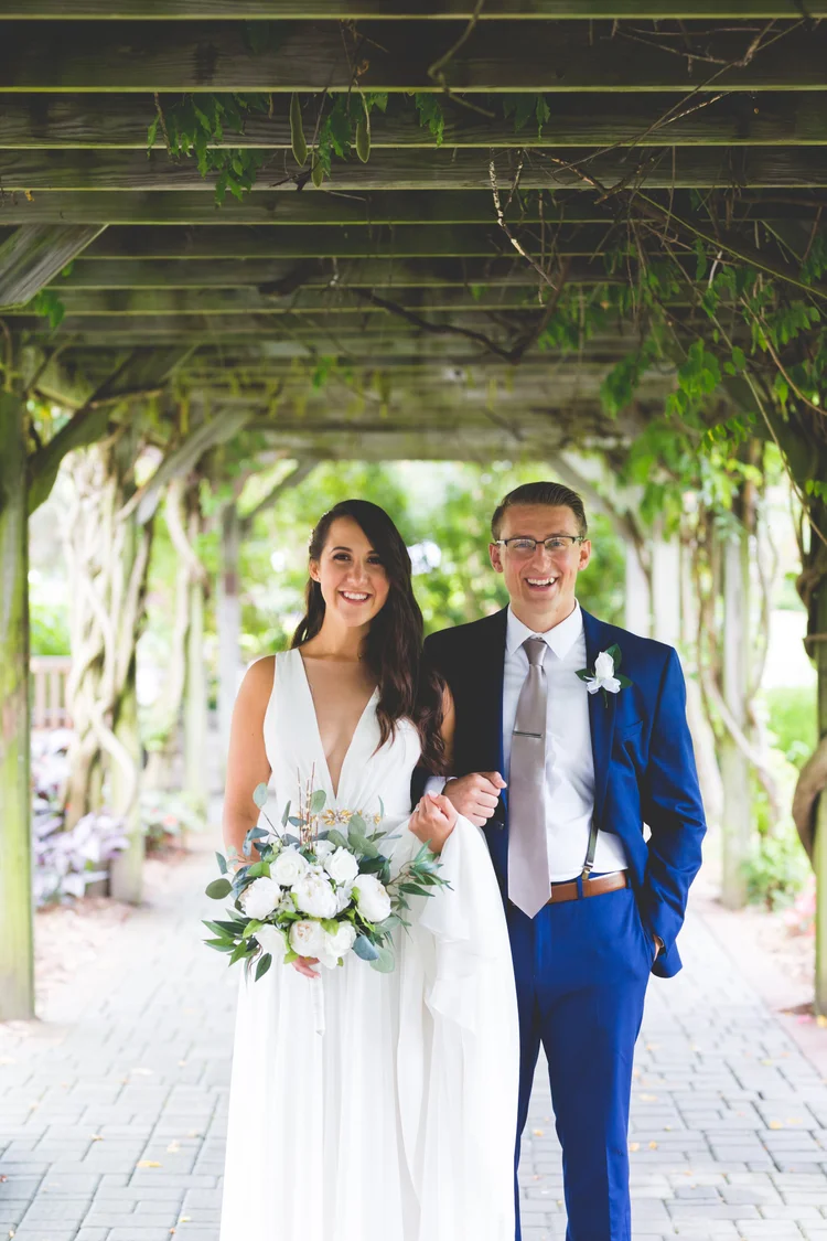 Ali and Josh on their wedding day, pictured in their 2018 story